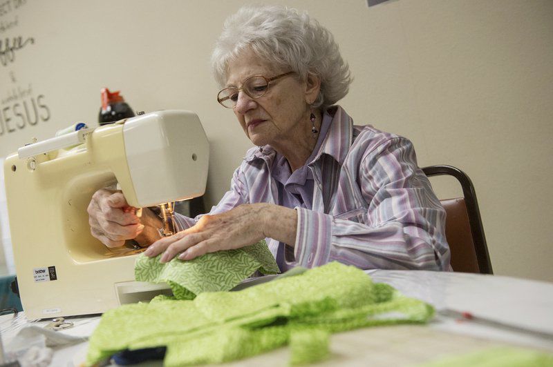 As demand for protective equipment grows, volunteers step up to make masks